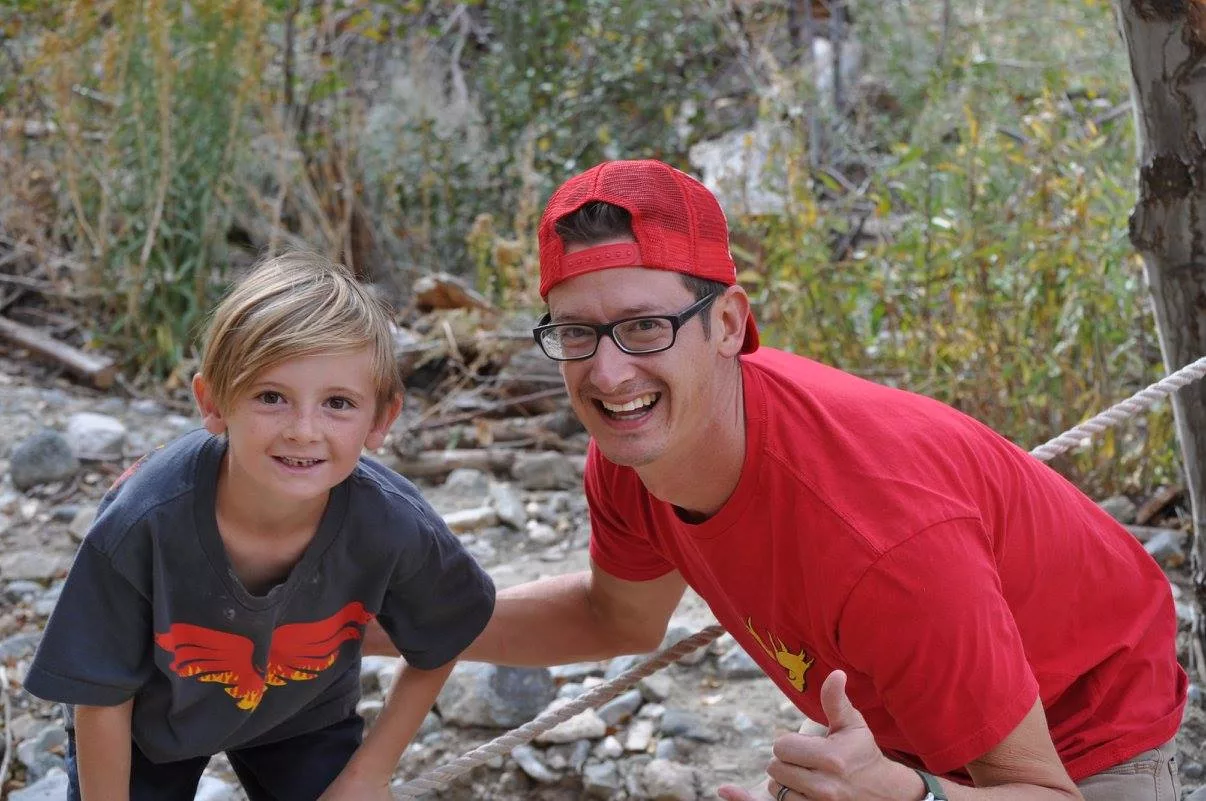 Father and son participating in a CampDads Adventure Club.